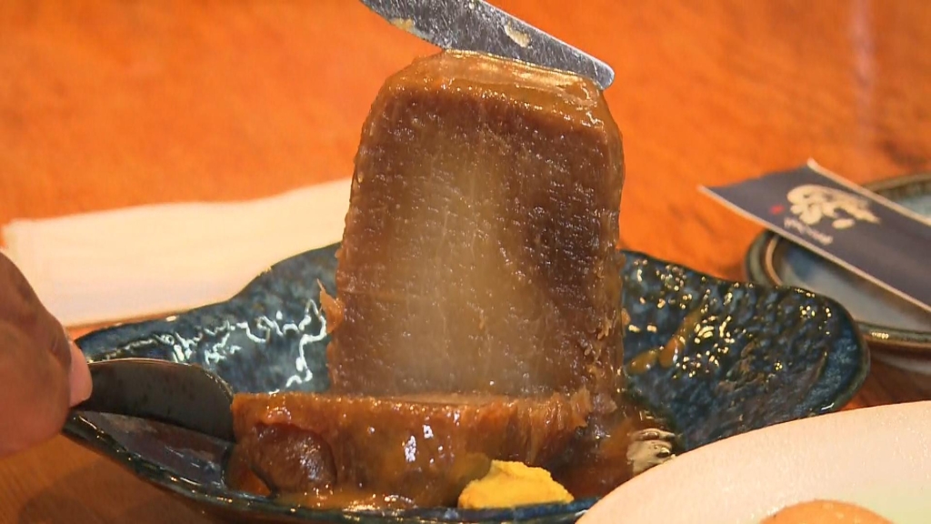 「大根」を半分に切った断面