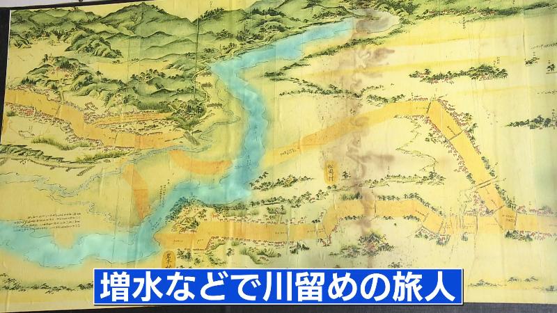 東海道の絵図のうち富士川の周辺「増水などで川留めの旅人が宿泊した」