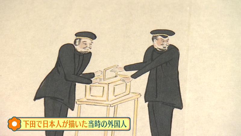 写真を撮る外国人の絵